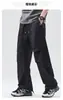Ropa para Hombre Xintang 2026 Pantalones de paracaidista funcionales de moda estilo americano para hombre, nuevo estilo primavera-verano, pantalones de trabajo rectos geniales y holgados
