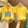 Camiseta de manga larga para niño 2026 nueva ropa de otoño para niños, camiseta básica de algodón puro de imitación de dos piezas para niño, top para niños mayores