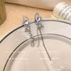Brincos assimétricos de borboleta com franjas de diamante femininos moda luxo leve senso de alta qualidade nicho versátil Coreia do Sul tarrachas de ouvido joias de orelha