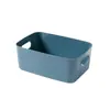 Cesta de almacenamiento de plástico simple transfronteriza para escritorio del hogar, caja organizadora de cosméticos y artículos varios con asa, al por mayor