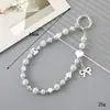 Ins Nuevo Colgante de Llavero con Lentejuelas y Lazo de Perlas para Funda de Teléfono Móvil Accesorios de Correa de Muñeca para Lanyard de Teléfono Móvil