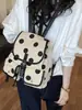 Mochila de Lona com Bolinhas Transfronteiriça de Nicho para Mulheres 2026 Nova Mochila de Viagem de Grande Capacidade Multibolsos Mochila Escolar para Estudantes