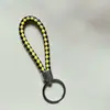 Llavero creativo llavero de cuerda de cuero cordón para llaves colgante de joyería cordón tejido fábrica de cuerda de cuero venta al por mayor
