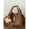 Bolsa de Mão Elegante Estilo Balde para o Dia a Dia de Mulheres 2026 Nova Moda Coreana Retrô de Ombro Único Transversal Bolsa Mãe e Filha