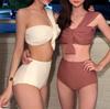 Versión coreana de traje de baño dividido para mujer, color sólido, hombros descubiertos, pecho pequeño fruncido, cintura alta, bikini ajustado con borde cruzado, fabricantes al por mayor