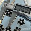 2023 nuevo resina gota de aceite borde dorado flor pequeña negra 21mm parche plano DIY en stock fábrica directo mayoreo