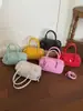 Bolsa Boston de Lunares Rosas para Mujer, Nuevo Modelo 2026, Bolso de Hombro Cruzado, Versátil para el Trayecto Diario, Diseño de Nicho de Alta Gama