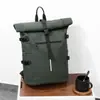 Mochila de negocios enrollable para hombre, nuevo modelo 2026, bolsa de viaje para computadora de gran capacidad, mochila estudiantil de color sólido a la moda