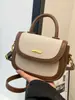Moda Transfronteriza 2026 Europeo y Americano Nuevo de Moda Versátil Bolso de Mano Bolso de Hombro Cruzado Elegante Simple Bloque de Color Bolso tipo Silla