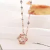 Collar elegante de estrella de seis puntas de estilo coreano para mujer, cadena de clavícula giratoria con microincrustaciones de diamantes finos, acero de titanio, chapado en oro real, sin decoloración