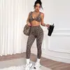 Nuevo conjunto de yoga sin costuras con estampado de leopardo europeo y americano transfronterizo, sujetador con efecto de melocotón en los glúteos, pantalones largos, ropa de yoga para fitness, conjunto deportivo