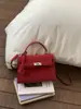 2026 Nova Moda Simples Retrô Bolsa Kelly para o Dia a Dia com um Toque de Luxo, Bolsa de Mão Transfronteiriça, Bolsa de Ombro e Bolsa Transversal para Mulheres