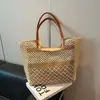 Bolsa de Tecido Grande Capacidade Transfronteiriça para Mulheres Moda Nova Primavera 2026 Bolsa de Ombro/Axila para Férias na Praia