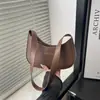 Bolso de Hombro Único de Alta Gama Otoño 2026 Nuevo Elegante y de Moda Versátil Simple Casual de Moda Texturizado Bolso de Luna Creciente