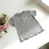 Nuevas Camisetas Frescas Versátiles de Colores Caramelo para Niñas, Camisetas de Moda de Color Sólido con Lazo Lindo para Bebés Niñas