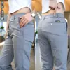 Comercio exterior transfronterizo verano finos pantalones casuales para hombre seda de hielo casual pierna recta holgados largos versátiles pantalones ajustados hombre