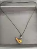 Collar de pez y oso de madera 2026 nuevo estilo vintage colgante con cordón cadena para clavícula diseño de nicho joyería al por mayor