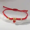 Pulseira trançada com fio vermelho estilo chinês com símbolos auspiciosos, flores, estrela-do-mar, elefante auspicioso e Deus da Riqueza, ajustável para o ano do zodíaco, coleção de pulseiras