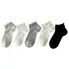 Calcetines de mujer para primavera/verano estilo coreano ins de color liso con borde de volantes hasta la mitad de la pantorrilla con rayas verticales y malla hueca para transpirabilidad