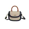 Moda Transfronteriza 2026 Europeo y Americano Nuevo de Moda Versátil Bolso de Mano Bolso de Hombro Cruzado Elegante Simple Bloque de Color Bolso tipo Silla