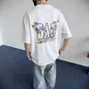 Camiseta Trendy de Marca para Hombre Estilo Retro Americano Ins con Estampado Floral de Manga Corta, Letras y Graffiti, Corte Oversize y Holgado