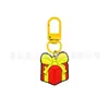 Llavero de Regalo de Navidad Más Vendido Hebilla en Forma de U de Macarrón Colgante de Goma Suave de PVC de Dibujos Animados Accesorios para Bolsas Colgante Pequeño