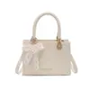 Bolso Femenino Súper Popular 2026 Nuevo Estilo de Moda Tendencia Bolso de Mano para Salir, Pequeño Cuadrado Cruzado al Hombro
