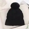 Bestseller transfronterizo de invierno: gorro tejido grueso con forro de polar y pompón, gorro clásico de punto trenzado versátil, gorro de lana de color liso a la moda
