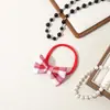 Accesorios para el cabello de mariposa a cuadros para bebé más vendidos en Europa y América, Accesorios para el cabello de tela con ambiente navideño para bebé, Diadema elástica de terciopelo