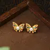 Nuevos Pendientes de Plata S925 con Aguja de Plata Estilo Chino de Gama Alta con Forma de Mariposa para Mujer, Hermosos Pendientes Versátiles de Perla con Luz de Lujo