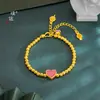 Loja de ouro Puzuo com pulseira de miçangas de ouro com areia em formato de coração com borla, pulseira doce versátil para presente de namorada