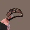 Pinza para el pelo acrílica hueca de diseño único para mujer, nuevo clip de tiburón popular otoño 2026, pinza de garra de peinado de alta gama