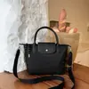 Bolso de mano de moda para mujer 2026 nuevo bolso tote de gran capacidad bolso cruzado casual bolso de hombro versátil para el día a día