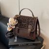 Mochila transfronteriza con estampado de leopardo para mujer, diseño de nicho de moda, portátil, estilo coreano casual, mochila escolar para estudiante, mochila moderna y ligera