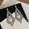 Brincos de Agulha de Prata Transfronteiriços com Design de Folha Oca Cravejada de Diamantes, Brincos Versáteis e Modernos Estilo Europeu e Americano, Luxo Leve com Sensação de Alto Padrão, Artesanato Requintado