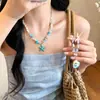 Collar de cuentas de estrella de mar color dopamina para mujer, estilo vacación en la playa, colgante de estrella con diseño único y exquisito