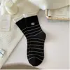 Meias 100% Algodão Estilo Coreano Bordado de Ovo Outono e Inverno Listradas Falsas Duas Camadas Estilo College Meias Listradas Largas Algodão Puro Femininas Meio Cano