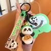 Llavero de la suerte de Panda genuino descompresión llavero de dibujos animados colgante pequeño recuerdo de panda de Chengdu al por mayor