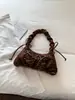 Coleção de outono 2026 transfronteiriça: bolsa de mão plissada com laço de nicho, bolsa de ombro estilo coreano, bolsa de ombro da moda