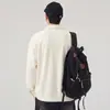 Moletom masculino 2026 primavera e outono novo estilo, gola alta, jaqueta pulôver com meio zíper, estilo japonês texturizado, jaqueta da moda de cor sólida