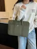 Bolsa de color sólido de gran capacidad para mujer, nueva versión coreana 2026, bolsa de mano para el trabajo, bolsa versátil informal para portátil