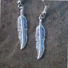 Europa y Estados Unidos joyería transfronteriza nuevos aretes retro simples aleación pluma hoja aretes exquisitos anillos para mujer