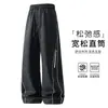 Calça reta moderna para a nova estação de primavera e outono para homens, com estilo casual americano, tamanhos grandes, corte solto e design versátil de perna larga adequado para esportes.