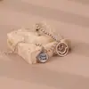Pulseira de rosto sorridente vazado da moda coreana feminina simples redonda em inglês Marca Vento Frio corrente de contas esféricas joia nova 2022