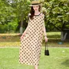 Novo Vestido de Verão 2026 para Mulheres, Soltinho Plus Size, Emagrecedor, Sem Mangas, Estampado, Vestido Longo para Mães, Estilo de Férias na Praia
