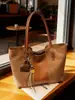 Bolso de mano grande retro para otoño e invierno para mujer, de alta gama y ligero, bolso de hombro elegante con gran capacidad, 2026 transfronterizo