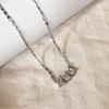 Nuevo collar con colgante de circonita grande y pequeño transfronterizo, chapado en cobre y oro auténtico, cadena de clavícula de alta calidad, cadena de suéter para mujer