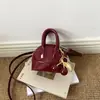 Acabado Espejo Primavera 2026 Nueva Moda Mini Simple Único Versátil Hombro Cruzado de Mano Bolso Tipo Concha