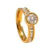 Anillo de Moda de Acero Inoxidable de Venta Caliente Transfronteriza Soldado Marca Incrustado con Anillo de Circonita Redonda Diseño de Nicho Femenino Fábrica de Joyería de Acero de Titanio