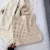 Bolsa de Ombro Única Vazada Tecida à Mão Feminina Transfronteiriça Nova Bolsa Tote Bolsa de Praia Grande Capacidade Bolsa de Mão Fashion